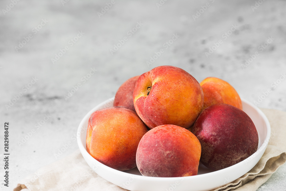 Pears in white dishes on a light background Pears in white dishes on a light background