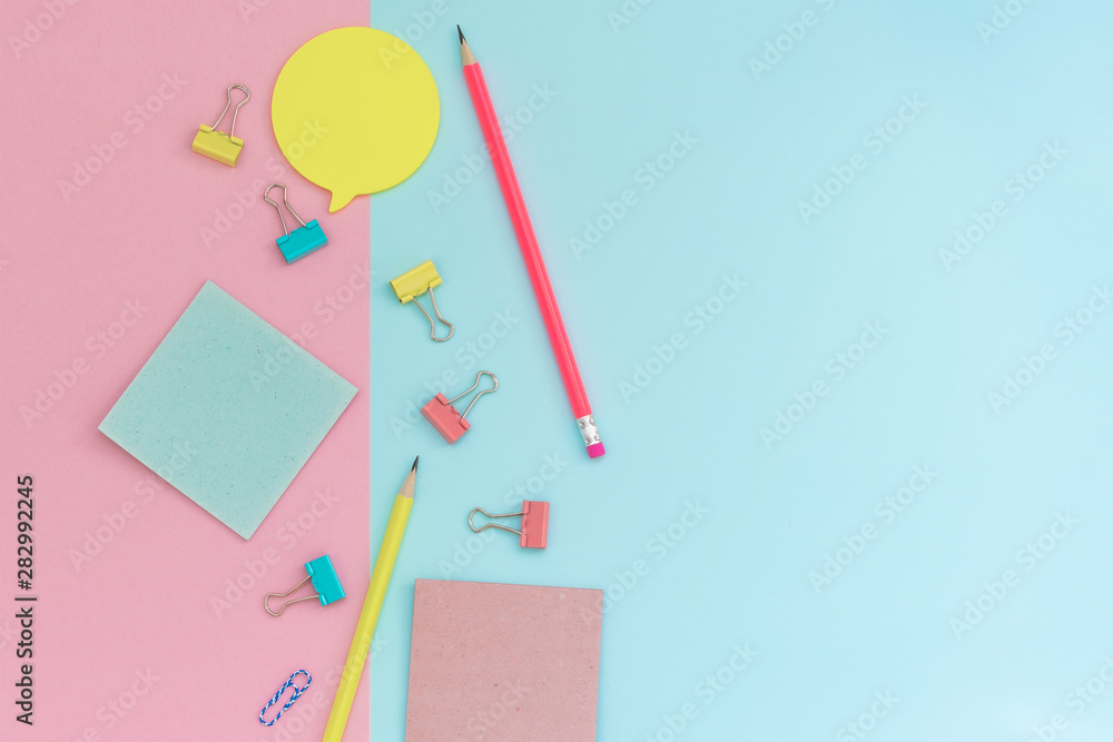 School stationery on a pink and blue background. Back to school creative background, template. Creative, fashionable, minimalistic, office workspace with supplies on pink-blue background. Flat lay. School stationery on a pink and blue background. Back to school creative background, template. Creative, fashionable, minimalistic, office workspace with supplies on pink-blue background. Flat lay.