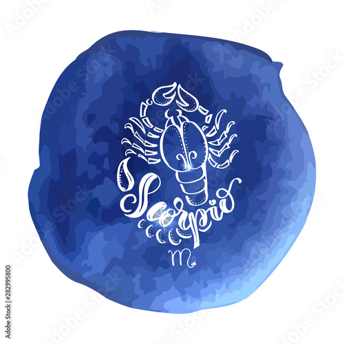 Astrology sign on blue watercolor background with modern letteri photo