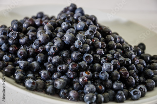 tasty blueberries in a plate. Close-up.