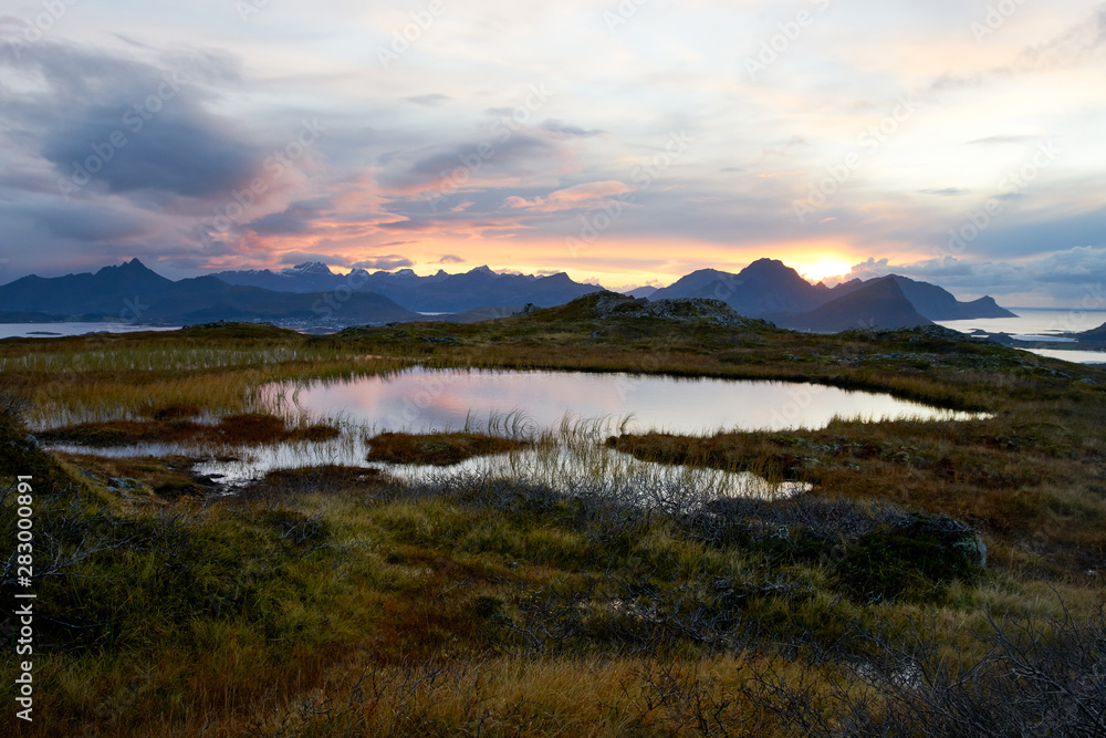 Obraz premium Sunset over mountains on Lofoten Islands in Norway