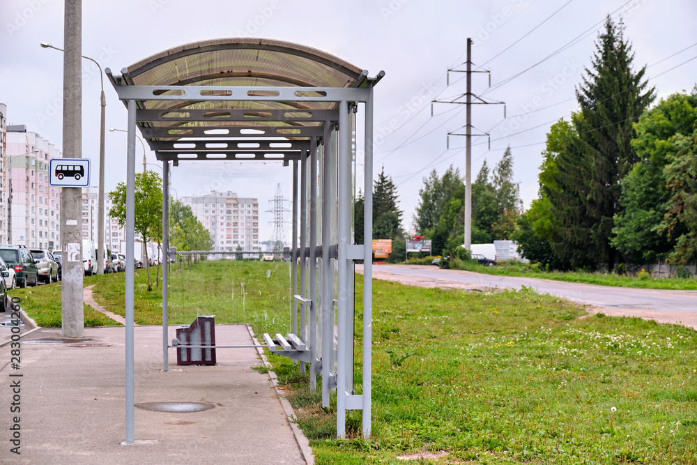 A bus stop for public transport in the city on an overcast summer morning