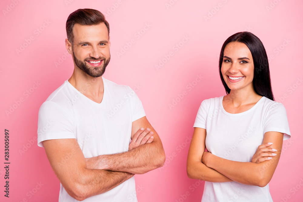 Portrait of his he her she two nice attractive lovely cheerful cheery spouses folded arms idyllic harmony match isolated over pink pastel background Portrait of his he her she two nice attractive lovely cheerful cheery spouses folded arms idyllic harmony match isolated over pink pastel background