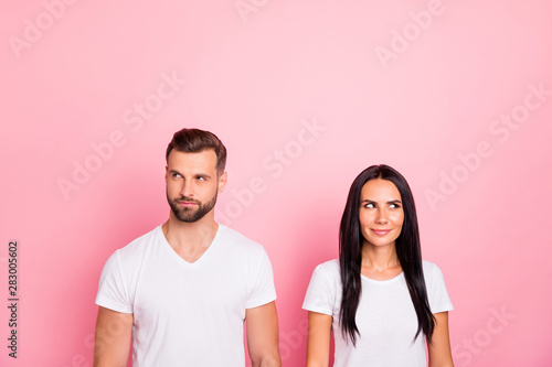 Portrait of his he her she two nice-looking attractive lovely charming cute winsome cheerful person looking aside thinking isolated over pink pastel background © deagreez