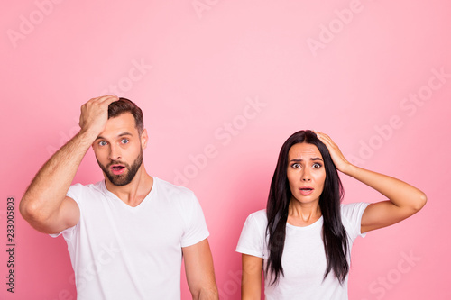 Portrait of his he her she two nice-looking attractive lovely disappointed sullen dissatisfied confused person isolated over pink pastel background