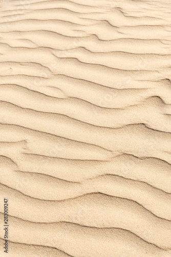 full frame background of smooth sand wave texture