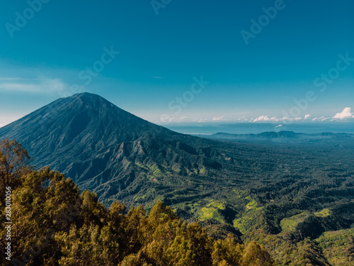 Aerial view of Agung volcano and mountain with forest in Bali