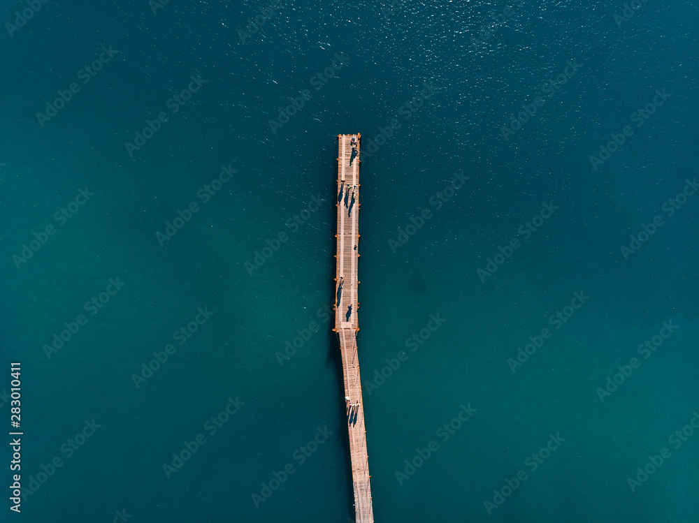Top view with blue sea and pier, aerial view Top view with blue sea and pier, aerial view