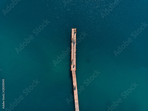 Top view with blue sea and pier, aerial view