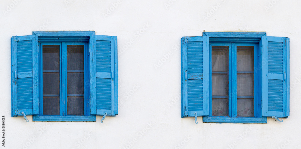 blue window with two covers