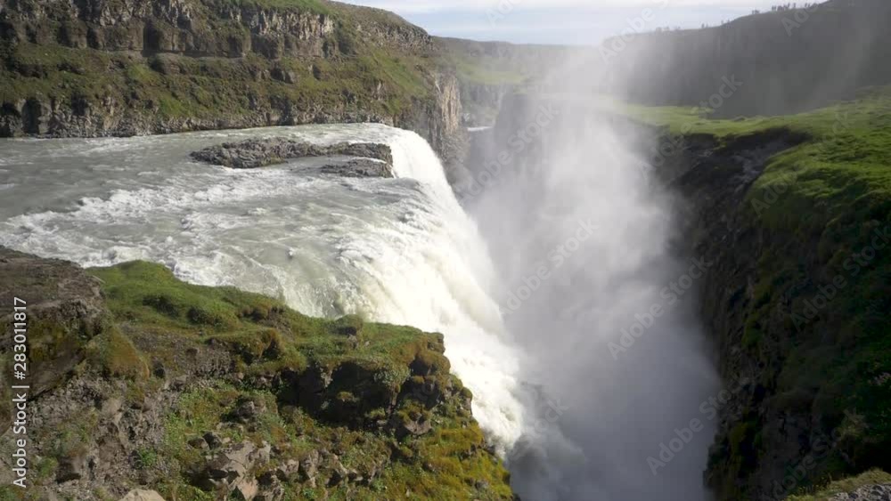 Gullfoss waterfall in Iceland with rising water mist. Slow motion Gullfoss waterfall in Iceland with rising water mist. Slow motion