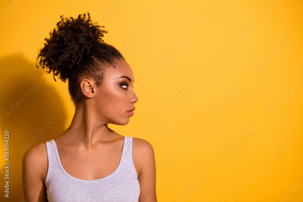 Close up side profile photo beautiful she her dark skin lady weekend vacation summer street look not smiling attentive listen concentrated wear casual tank-top isolated vivid yellow background Close up side profile photo beautiful she her dark skin lady weekend vacation summer street look not smiling attentive listen concentrated wear casual tank-top isolated vivid yellow background