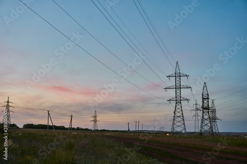 electric towers on the background of a beautiful sunset
