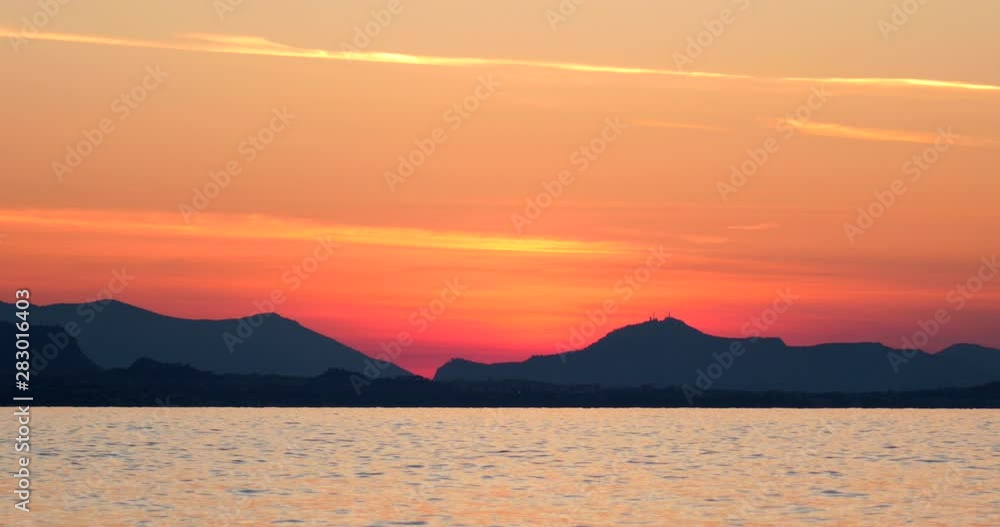 Seagull with a beautiful sunset in Corsica Seagull with a beautiful sunset in Corsica