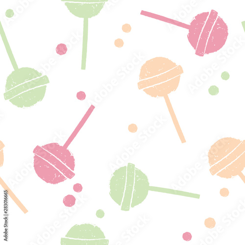 Candy lollipop on a stick, handdrawn pattern on white background © jullyromas