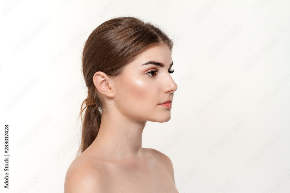 Close-up portrait of a happy beautiful young girl isolated over white background. Close-up portrait of a happy beautiful young girl isolated over white background.