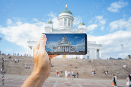 Obraz na plátně HELSINKI, FINLAND - JULY 27, 2019:  Smartphone photo of touristic view of Helsi