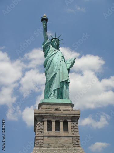 New York City USA Statue of Liberty low-angle shot summer blue sky