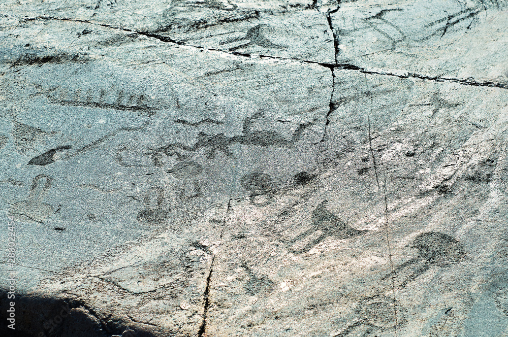 Ταπετσαρία Ancient engravings petroglyphs on the natural stone plates located on the cape B