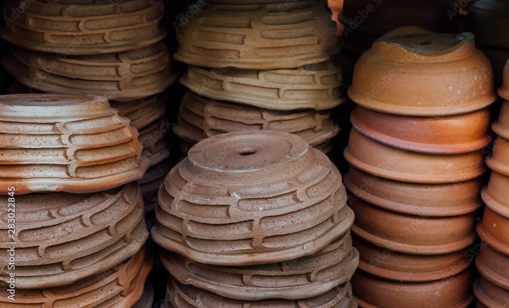 stack of clay pot in gardening shop stack of clay pot in gardening shop