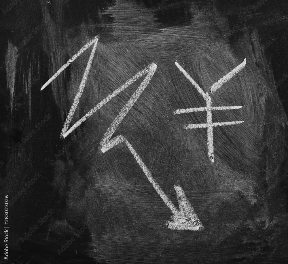 symbol of yuan currency failing, business failure drawn on black chalkboard, blackboard texture and background
