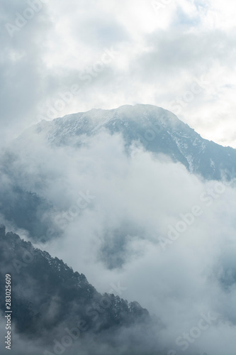Mountains peaks in mist in North Sikkim, India