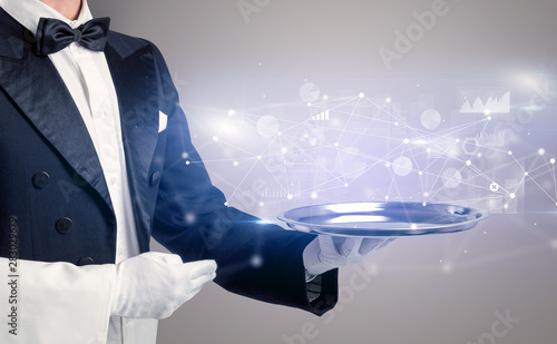 Young waiter serving financial concept on a metal tray