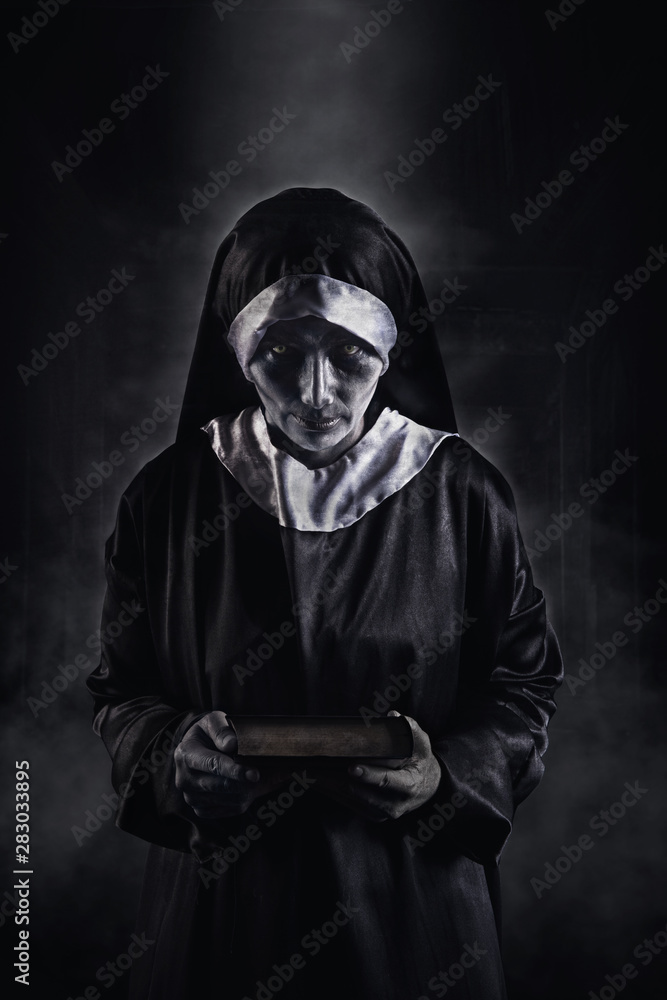 Horror Scene of a Possessed nun Woman ghost halloween in dark room ...
