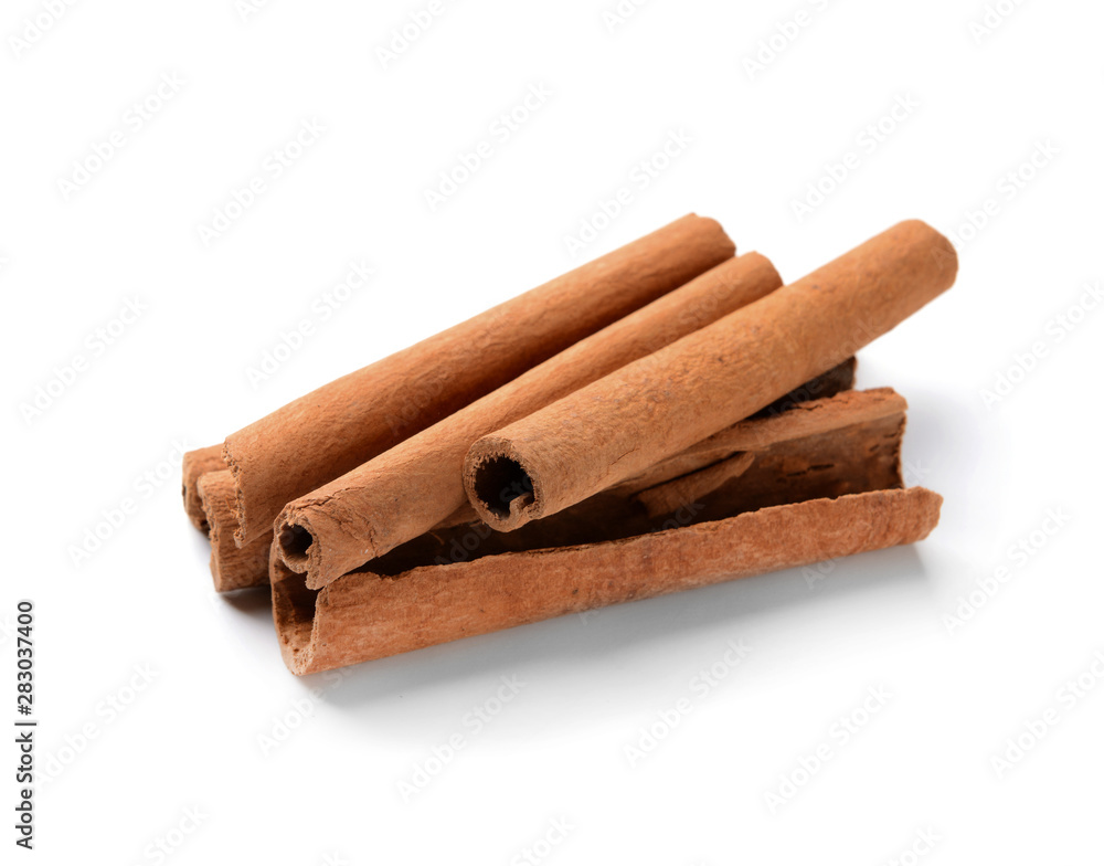 Aromatic cinnamon sticks on white background Aromatic cinnamon sticks on white background