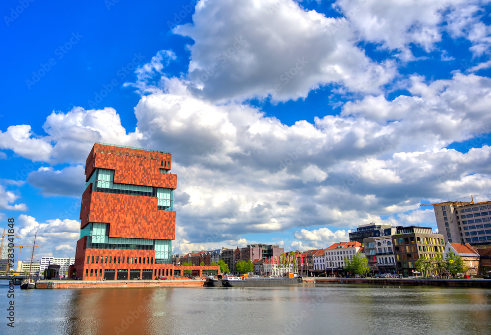 Antwerp, Belgium - April 26, 2019: Museum aan de Stroom (MAS) along the river Scheldt and the Port of Antwerp in Antwerp, Belgium.