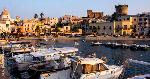 Sunset view on boats from the Marina of Forio, Ischia island, Italy. Soccorso Church, castle of Forio, Tyrrhenian Sea, South Europe. – Image photo