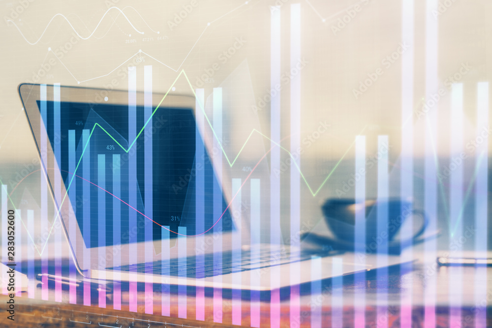 Stock market graph and table with computer background. Double exposure. Concept of financial analysis. Stock market graph and table with computer background. Double exposure. Concept of financial analysis.