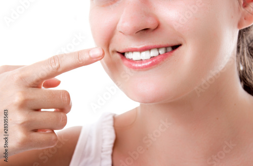 Beautiful smiling woman with healthy teeth, all natural