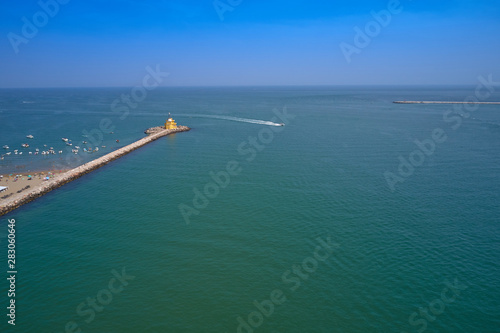 Aerial view lighthouse Punta Sabbioni Leuchtturm entrance in Venice, Italy. The main lighthouse at the entrance to the city of Venice. Resorts of Venice. Tourist place. © Berg