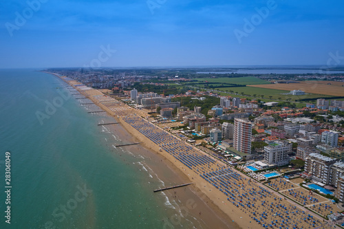 Aerial view Jesolo beach near Venice, Italy. Resort town in the north of Italy. Resorts of the Adriatic Sea. photo