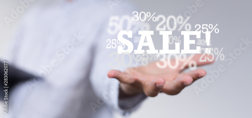 SALE CONCEPT DIGITAL in hand