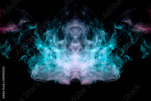 Abstract image of a bird's head made of wavy smoke of green and pink in the form of a pattern on a black background. Print for clothes.