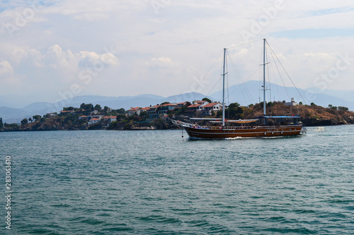 June 17, 2019 Fethiye Turkey. - Sailing pleasure boat leaves the bay. Fethiye, Turkey