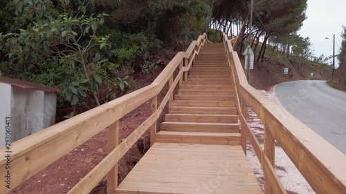 Escarpas footbridge wich links Macieira village to Porto Novo beach in Torres Vedras Portugal. photo