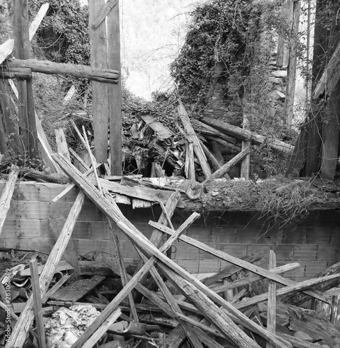 Old abandoned house after the earthquake with many broken woode