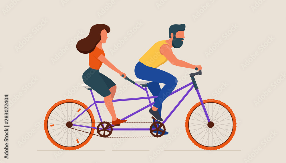 Man and woman riding tandem bicycle Man and woman riding tandem bicycle