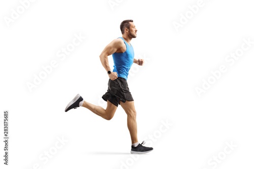 Young man jogging photo