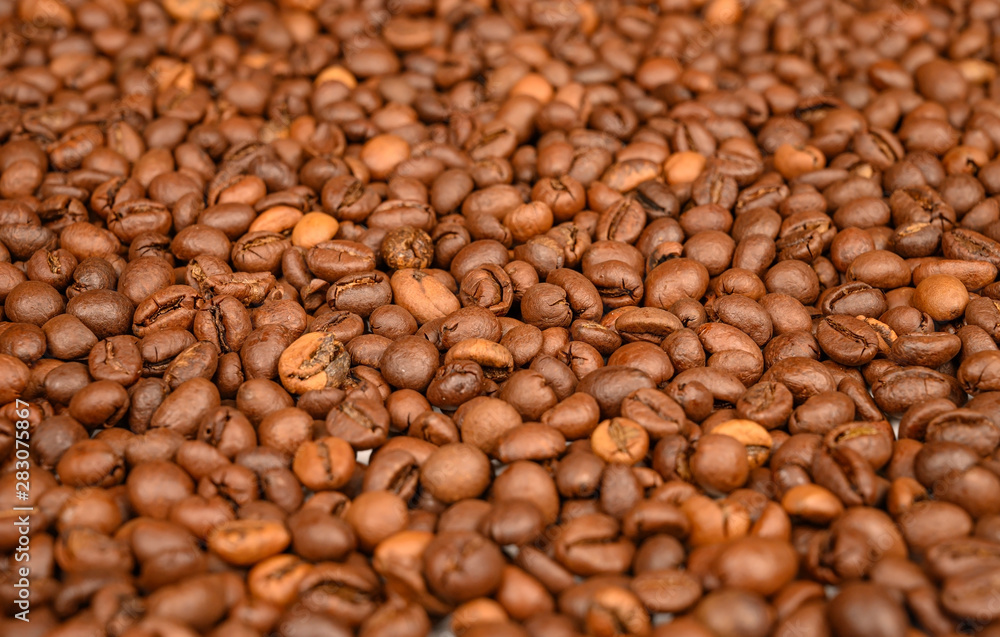 Roasted coffee beans close-up. Background image, texture Roasted coffee beans close-up. Background image, texture