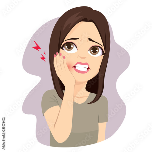 Young woman touching cheek with hand suffering toothache pain