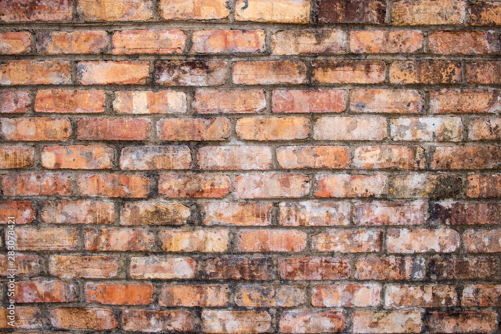 Wide Orange worn grunge brick wall surface background weathered dirty distressed texture Wide Orange worn grunge brick wall surface background weathered dirty distressed texture