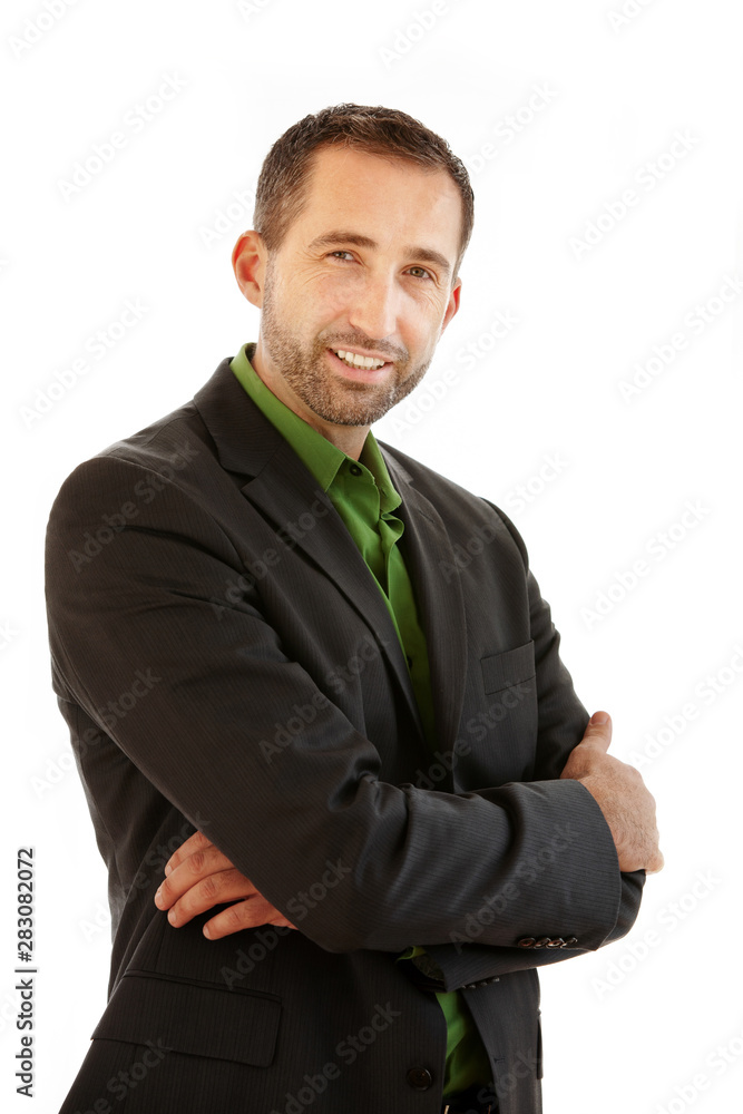 handsome businessman standing in a suit and smiles handsome businessman standing in a suit and smiles