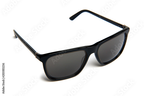 blue oval-shaped sunglasses on a white background. isolate
