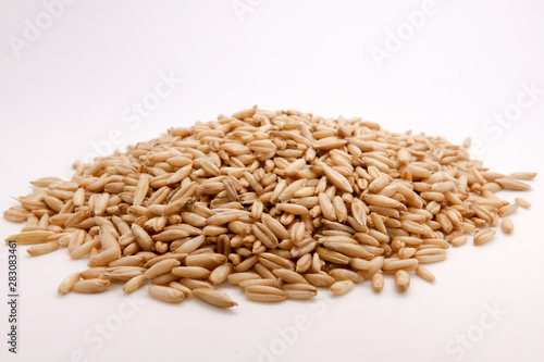 Fresh oats over white full as background
