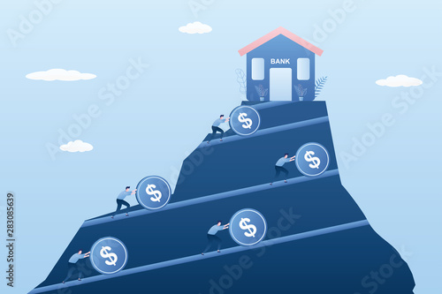 Bank building at the top of the mountain,businessmen rolls coins into the bank
