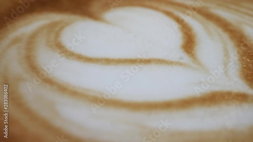 close-up latte art of hot coffee drink